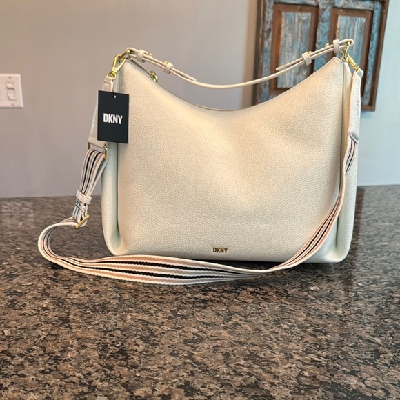 DKNY Hanley Hobo Cream Leather Bag with Gold Accents and guitar strap NWT - Picture 1 of 16
